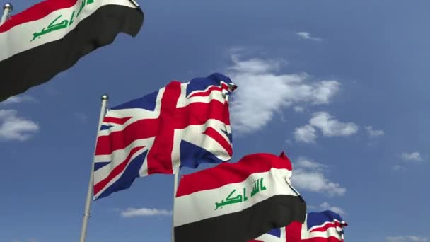 Flaggor i Irak och Storbritannien på internationella möte, loopable 3D animation — Stockvideo