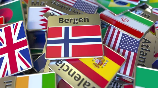 Magnete ricordo o distintivo con testo Bergen e bandiera nazionale tra quelli diversi. Viaggiare in Norvegia rendering 3D concettuale — Foto Stock