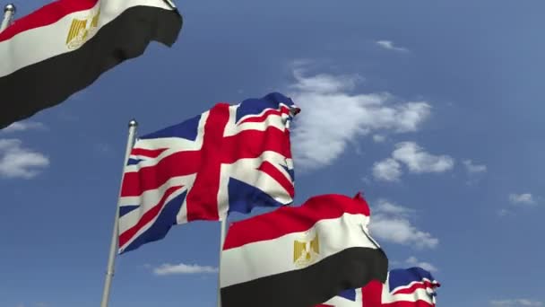 Bendera Mesir dan Inggris melawan langit biru, animasi 3D yang dapat diulang — Stok Video