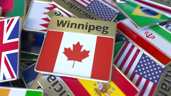 Imán de recuerdo o insignia con texto Winnipeg y bandera nacional entre diferentes. Viajar a Canadá renderizado 3D conceptual — Foto de Stock