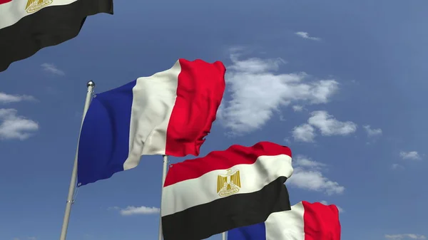 Vlajky Egypta a Francie proti modrému nebi, prostorové vykreslování — Stock fotografie