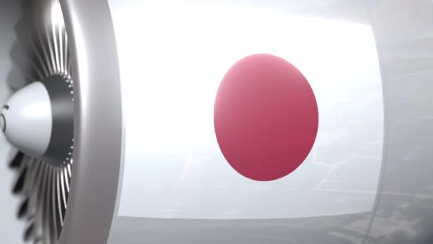 Motor de avión con bandera de Japón. Transporte aéreo japonés animación 3D conceptual — Vídeo de stock