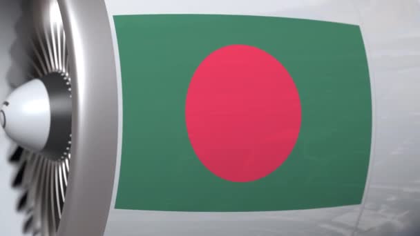 Vliegtuig motor met vlag van Bangladesh. Bangladeshi luchtvervoer conceptuele 3D-animatie — Stockvideo