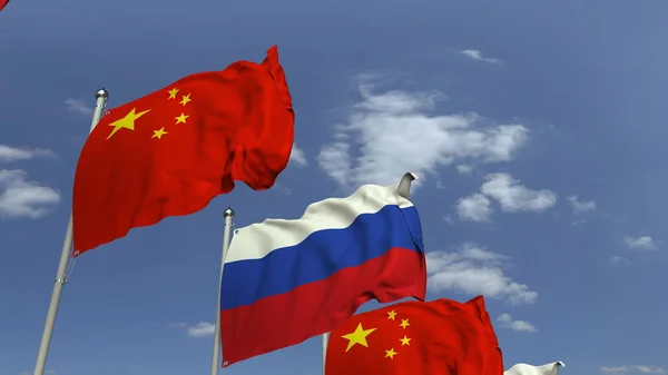 Флаги России и Китая против голубого неба, 3D рендеринг — стоковое фото