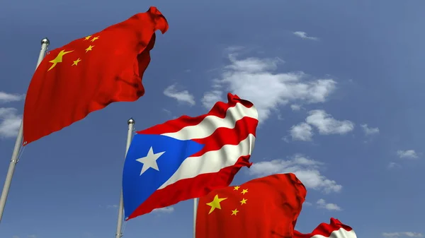 Gökyüzü arka plan üzerinde Porto Riko ve Çin bayrakları waving, 3d render — Stok fotoğraf