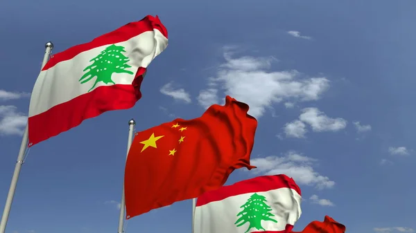空を背景にレバノンと中国の旗を振る,3Dレンダリング — ストック写真