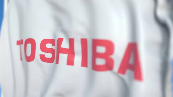 Toshiba Corporation logosu ile bayrak sallayarak, yakın çekim. Editoryal 3d render — Stok fotoğraf