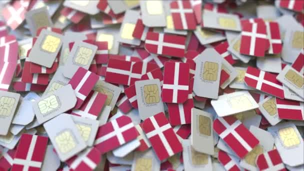 SIM-карты с флагом Дании. Концептуальная 3D анимация в сотовой сети Дании — стоковое видео