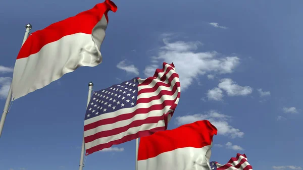 Bendera Indonesia dan Amerika Serikat melawan langit biru, render 3D — Stok Foto