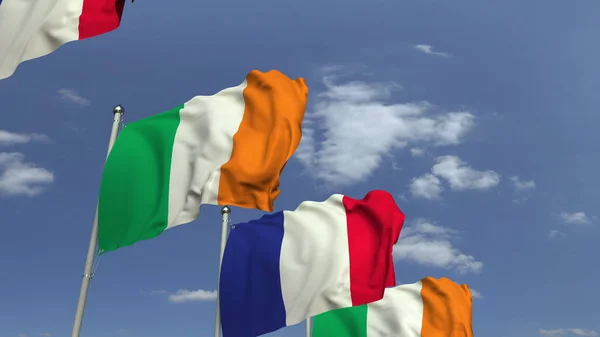 爱尔兰和法国国旗在国际会议上，3D渲染 — 图库照片