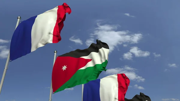 Розмахуючи прапори Йорданії та Франції на тлі неба, 3D-рендеринга — стокове фото