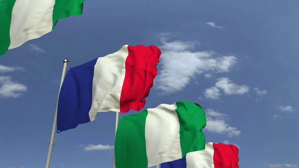 Nigerias flaggor och Frankrike mot Blue Sky, 3D-rendering — Stockfoto