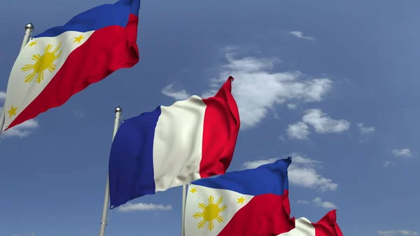 挥舞菲律宾和法国的旗帜，3D渲染 — 图库照片