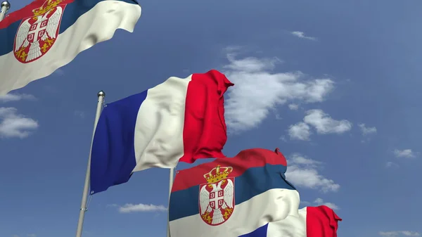 하늘 배경에 세르비아와 프랑스의 깃발을 흔들다, 3D 렌더링 — 스톡 사진