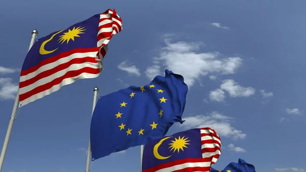 Vlajky Malajsie a Evropské unie proti modrému nebi, prostorové vykreslování — Stock fotografie