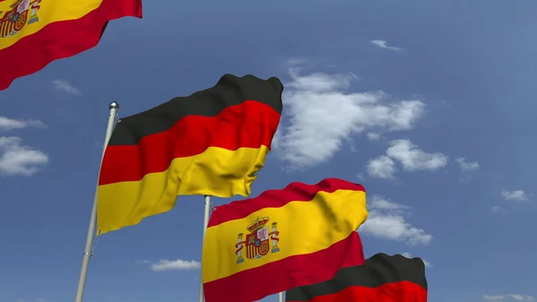 Veel vlaggen van Spanje en Duitsland, 3D-rendering — Stockfoto