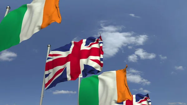 爱尔兰和英国国旗在国际会议上，3D渲染 — 图库照片