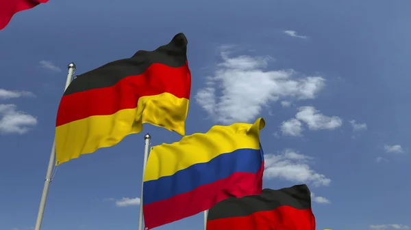 Vlag van Colombia en Duitsland tegen Blue Sky, 3D rendering — Stockfoto