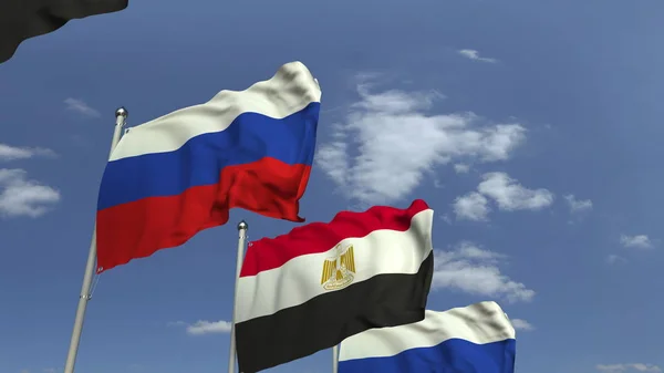 Vlajky Egypta a Ruska proti modrému nebi, prostorové vykreslování — Stock fotografie