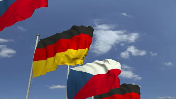 Zwaaiende vlaggen van de Tsjechische Republiek en Duitsland, 3D-rendering — Stockfoto