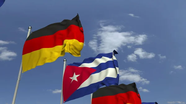 Drapeaux de Cuba et d'Allemagne contre le ciel bleu, rendu 3D — Photo