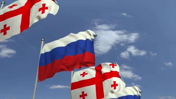 Baris melambaikan bendera Georgia dan Rusia, animasi 3D yang dapat diulang — Stok Video