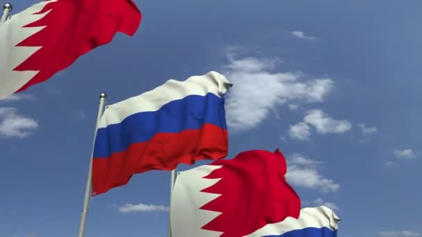 Рядок розмахуючи прапорами Бахрейну і Росії, що є "3D анімація" — стокове відео
