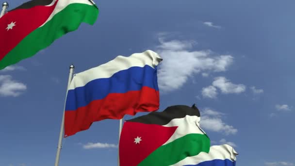 하늘 배경에 요르단과 러시아의 깃발을 흔들며, 반복 가능한 3D 애니메이션 — 비디오
