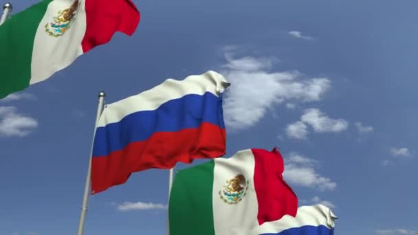 Размахивание флагами Мексики и России на фоне неба, зацикленная 3D анимация — стоковое видео
