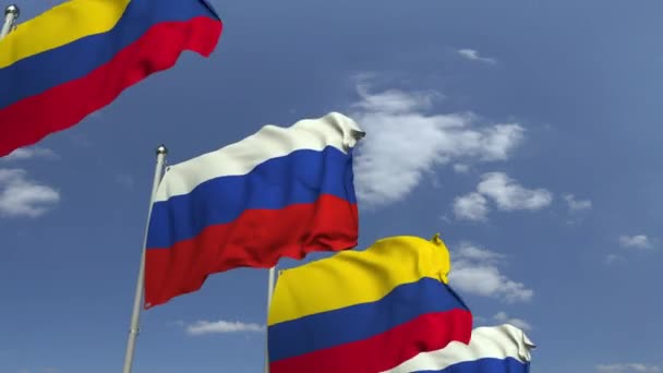 Прапори Колумбії і Росії проти синього неба, лунета 3D анімація — стокове відео