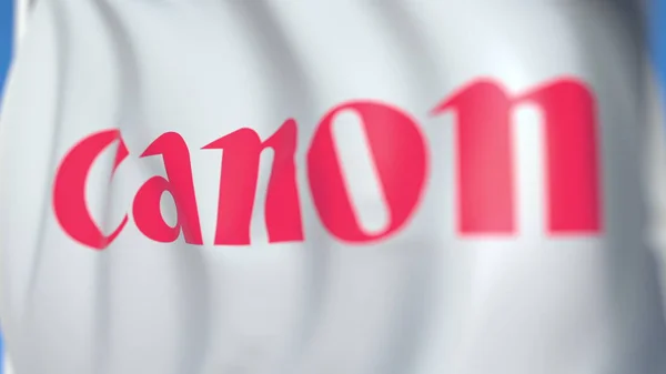 Bandera ondeando con el logotipo de Canon Inc., primer plano. Representación Editorial 3D —  Fotos de Stock