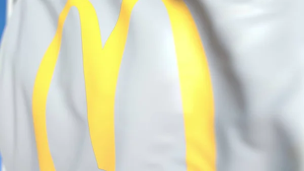 Mávající vlajka s logem McDonalds Corporation, zblízka. Redakční prostorové vykreslování — Stock fotografie