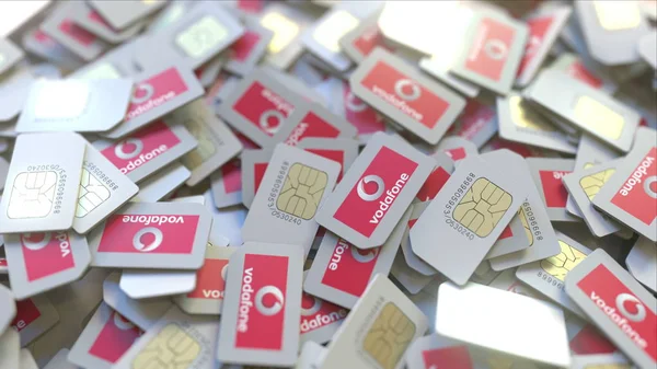 Stapel von SIM-Karten mit Vodafone plc Logo, Nahaufnahme. redaktionelle Telekommunikation im Zusammenhang mit 3D-Rendering — Stockfoto