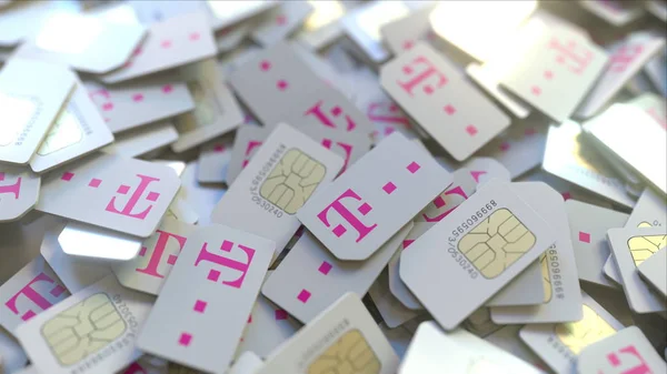 Pile of SIM cards with Deutsche Telekom AG logo, close-up. Editorial telecommunication related 3D rendering — Stock Photo, Image