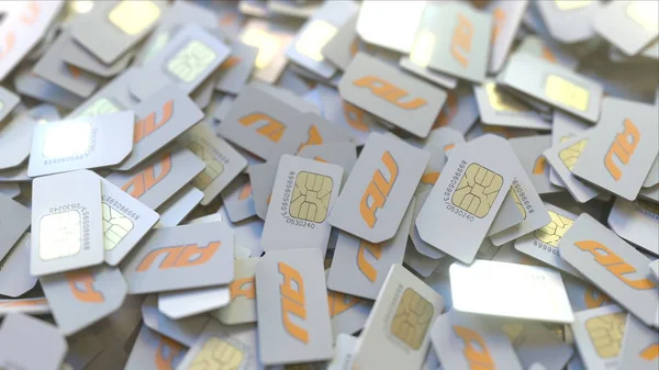Pile of SIM cards with au logo, close-up. Editorial telecommunication related 3D rendering — Stock Photo, Image