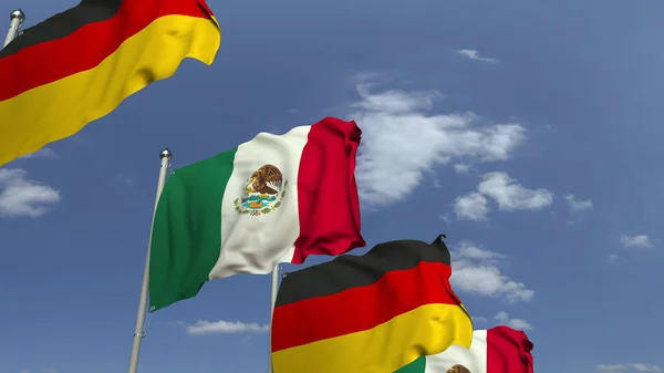 Wehende Fahnen Mexikos und Deutschlands auf Himmelshintergrund, 3D-Darstellung — Stockfoto