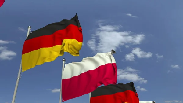 Размахивание флагами Польши и Германии, 3D рендеринг — стоковое фото