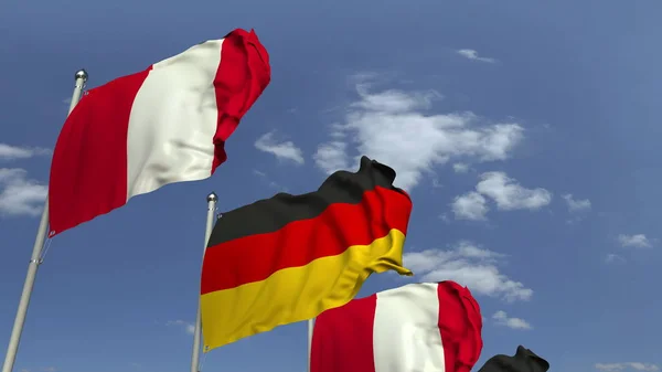 Veel vlaggen van Peru en Duitsland, 3D rendering — Stockfoto