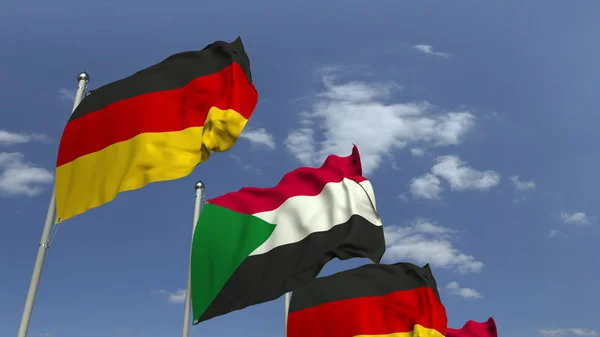 Wehende Fahnen von Sudan und Deutschland auf Himmelshintergrund, 3D-Darstellung — Stockfoto