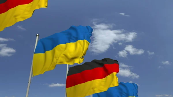Flaggen der Ukraine und Deutschlands bei internationalen Treffen, 3D-Darstellung — Stockfoto
