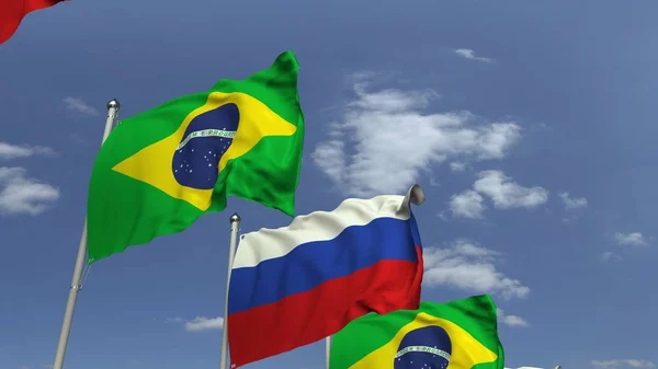 Ondeando banderas de Brasil y Rusia en el fondo del cielo, representación 3D — Foto de Stock