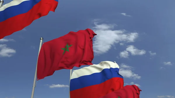 空の背景にモロッコとロシアの旗を振る,3Dレンダリング — ストック写真