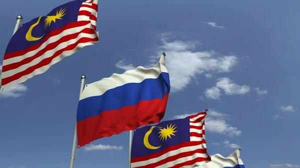푸른 하늘에 대한 말레이시아와 러시아의 국기, 3D 렌더링 — 스톡 사진