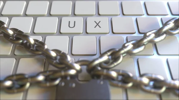 Cadenas avec chaînes sur le clavier avec texte UX sur les touches. rendu 3D conceptuel — Photo