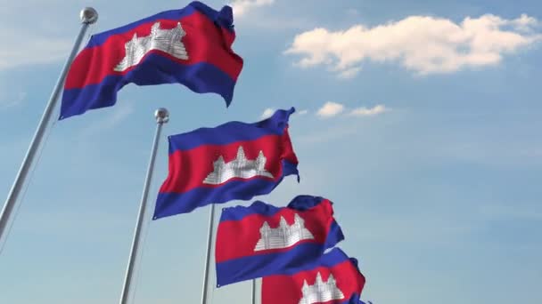 Многие размахивают флагами Камбоджи. Loopable 3D animation — стоковое видео