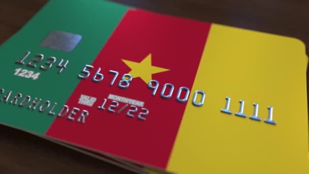 Műanyag bankkártya featuring zászlaja Kamerun. Cameroonian nemzeti bankrendszer kapcsolódó animáció — Stock videók