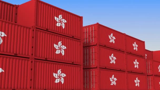 Terminal de contenedores lleno de contenedores con bandera de Hong Kong. Animación 3D loopable relacionada con la exportación o importación — Vídeos de Stock