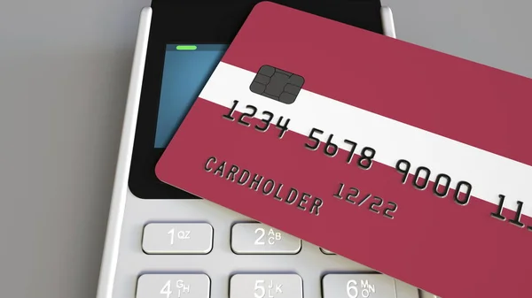 Plastic bank card featuring flag of Latvia and POS payment terminal. Latvian banking system or retail related 3D rendering