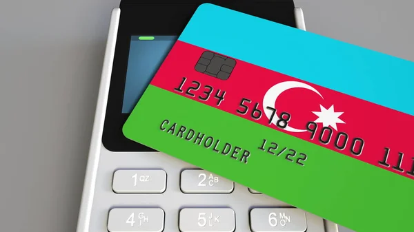 Plastic bank card featuring flag of Azerbaijan and POS payment terminal. Azerbaijani banking system or retail related 3D rendering