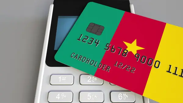 Plastic bank card featuring flag of Cameroon and POS payment terminal. Cameroonian banking system or retail related 3D rendering